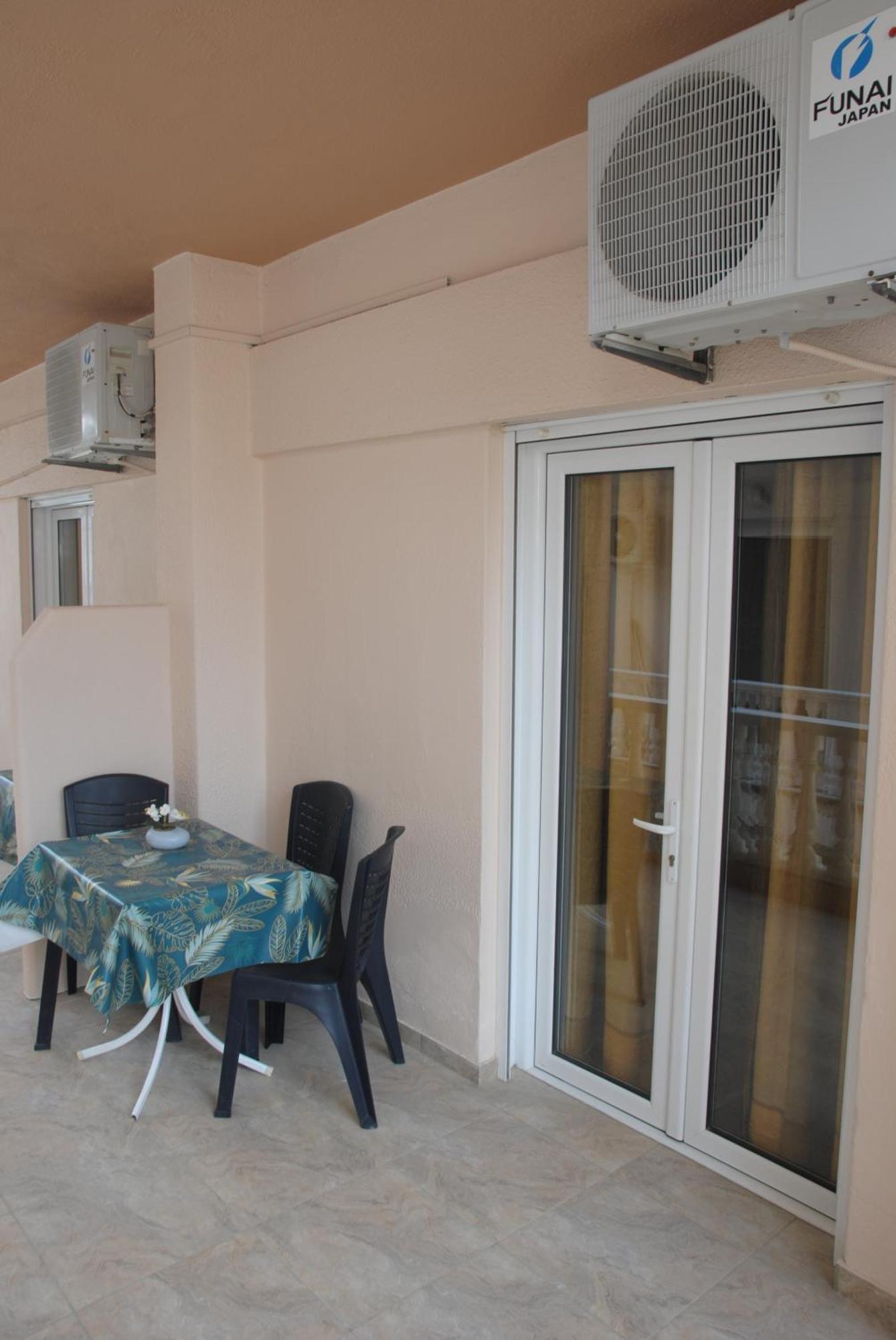 Light Blue Paralia Apartments Buitenkant foto